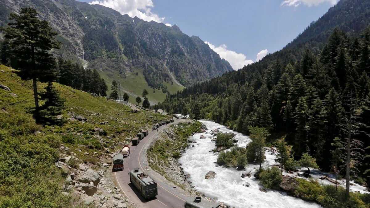 An Indian Army convoy moves along a highway leading to Ladakh.— Reuters file
