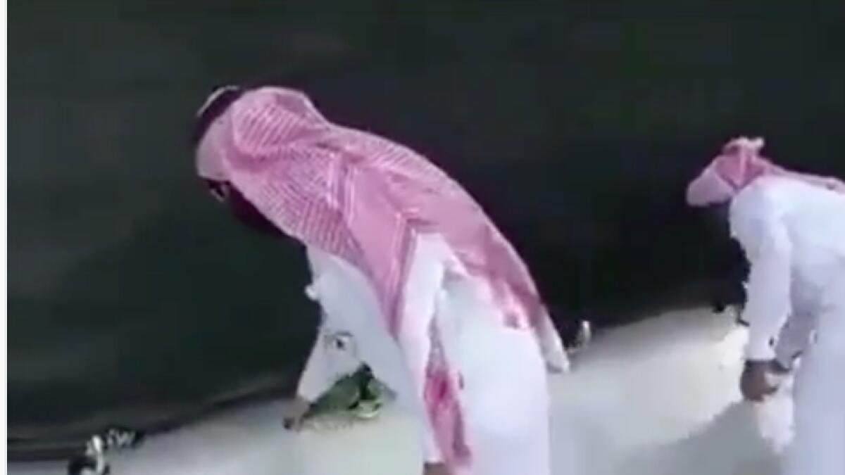 Holy Kaaba scrubbed clean after man tries to burn himself