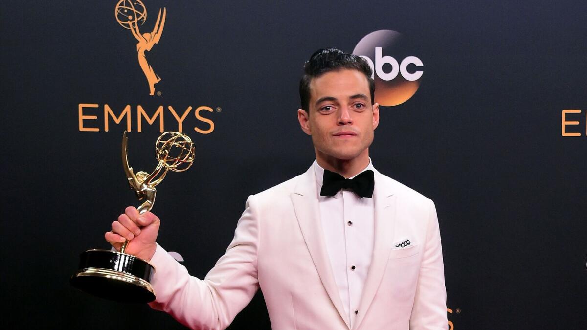 Actor Rami Malek poses with the Emmy for Outstanding Lead Actor in a Drama Series, in the press room during the 68th Emmy Awards on September 18, 2016 at the Microsoft Theatre in Los Angeles. AFP