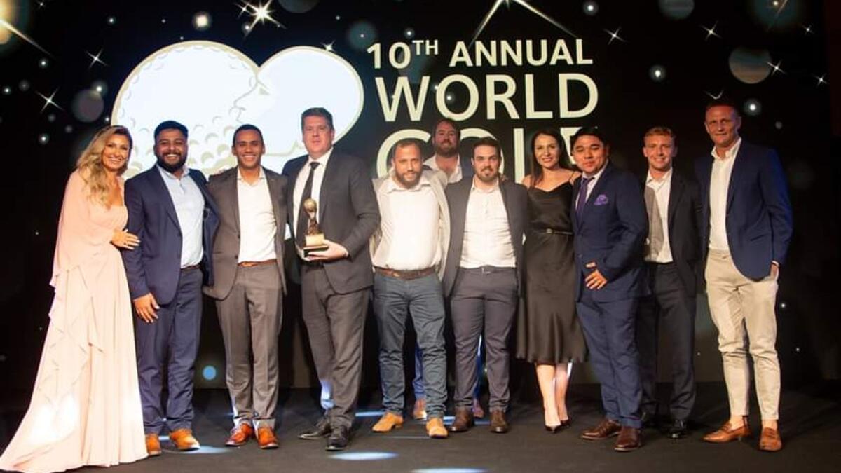 Officials and members of The Els Club, Dubai celebrate  after winning the ‘Best Golf Course in the Middle East’ award at the World Golf Awards. - The Els Club/ Facebook