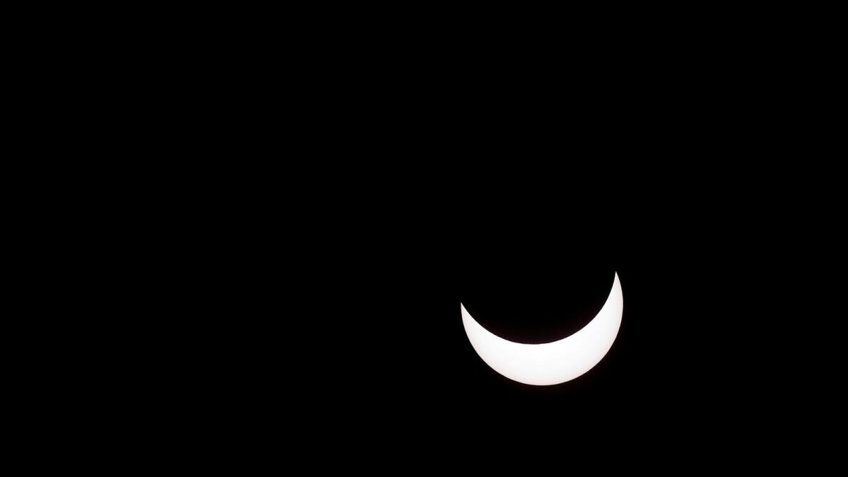 Partial solar eclipse taken on December 14, 2020 in Buenos Aires, Argentina.  REUTERS/Agustin Marcarian