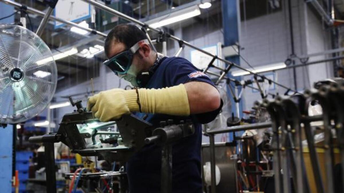 UK industrial sector grows, but business morale down