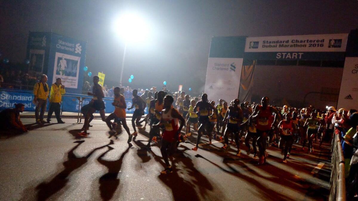 Runners take part at the Standard Chartered Dubai Marathon 2016.