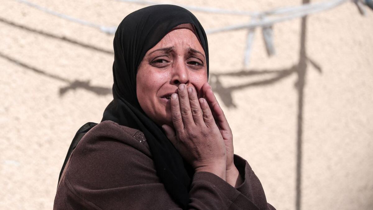 A Palestinian woman mourns a relative killed during overnight Israeli bombardment on Deir Al Balah. Photo: AFP