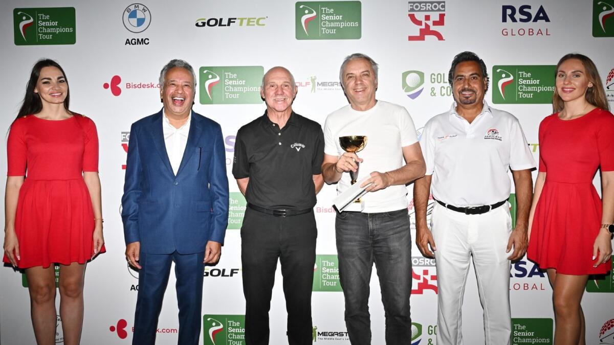 General Abdullah Alhashmi, Peter Cowen and Vijay Vasu during the prize presentation ceremony of The Senior Champions Tour at Dubai Hills Golf Club. - Supplied photo