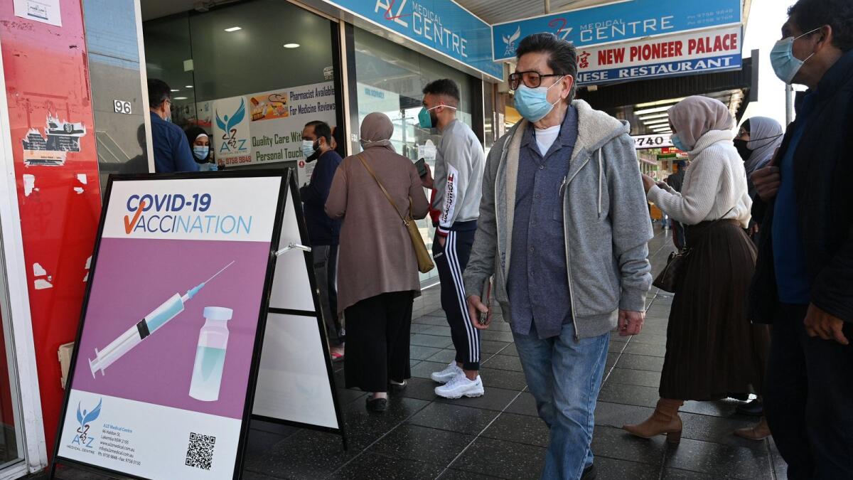 Residents queue up outside a pharmacy for Covid-19 vaccination in Sydney. Photo: AFP