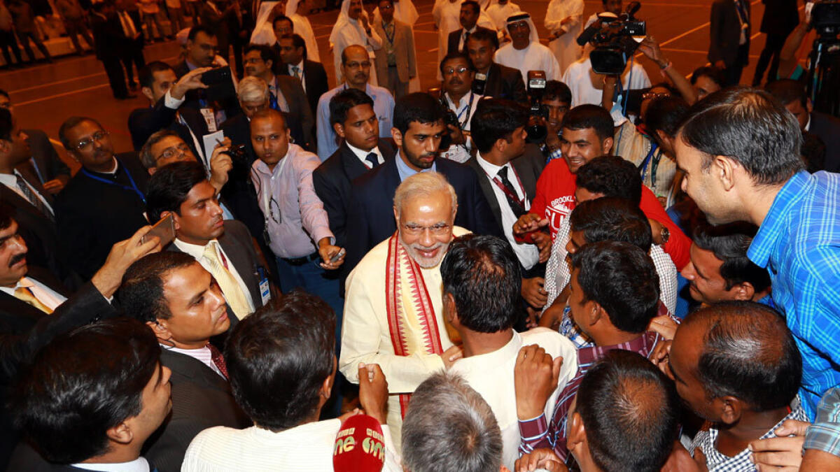 Modi interacting with workers at a labour accommodation in the Industrial City of abu Dhabi (ICaD) on Sunday.