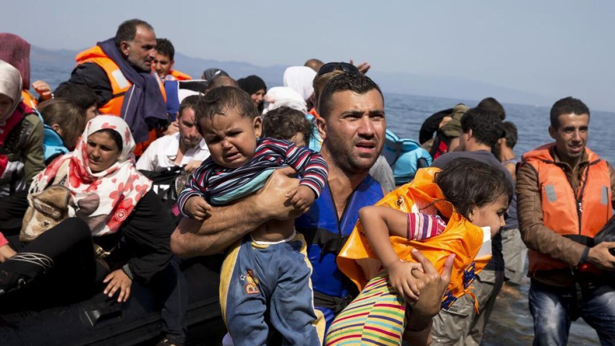 EU ministers agree to relocate 40,000 refugees