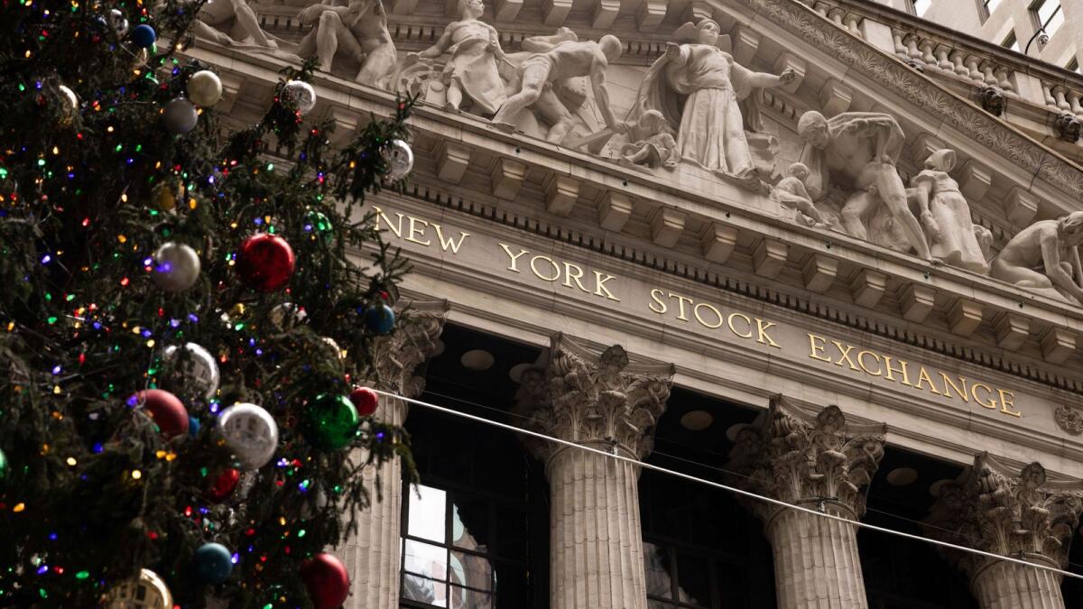 A Christmas tree stands in front of the New York Stock Exchange. (Photo: AP)