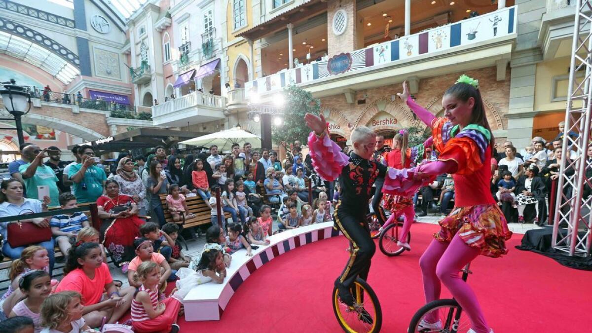 People enjoying the Circo Latino Show as part of the Dubai Summer Surprises at the Mercato Mall in Dubai. 