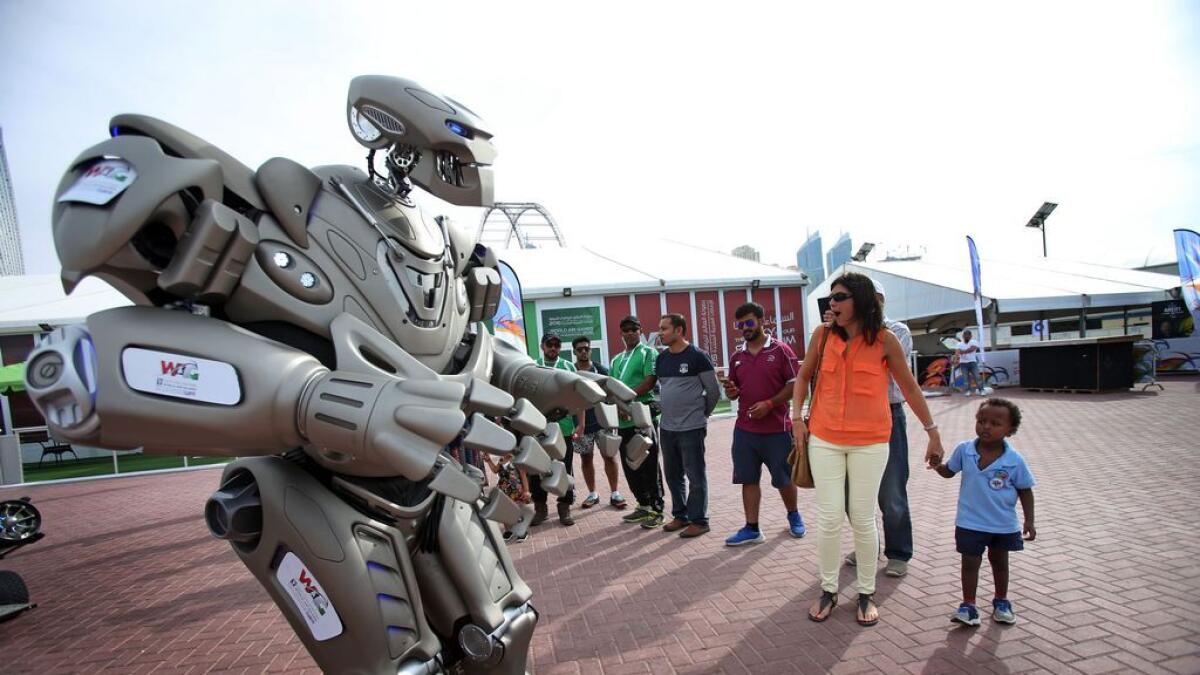 A robot interacts with people during the World Air Games at the Sky Dive Dubai.-Photo by Dhes Handumon/Khaleej Times