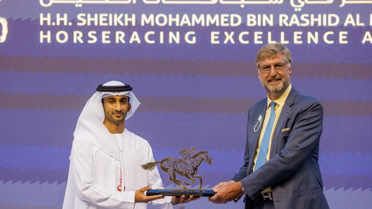 On behalf of Prince Abdulrahman Al Faisal, Tom Voute receives the award from Sheikh Rashid bin Dalmook bin Juma Al Maktoum, Chairman of Dubai Racing Club and Dubai Equestrian Club. (Supplied photo)