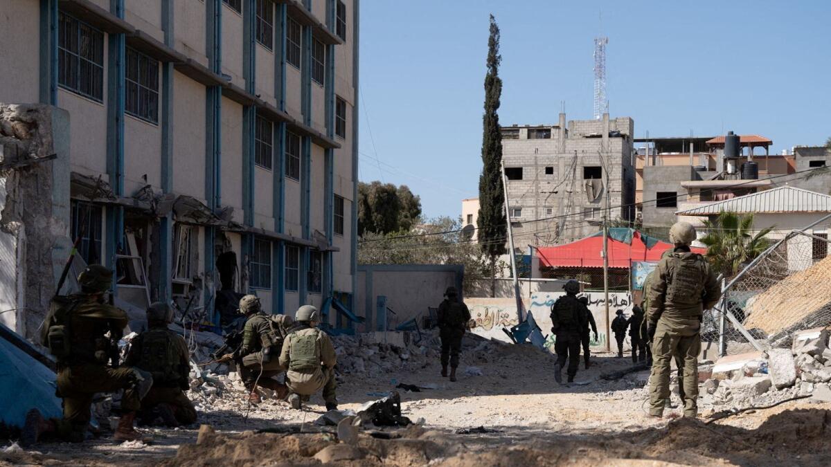 Israeli soldiers operate in Nasser Hospital in Gaza. — Reuters file