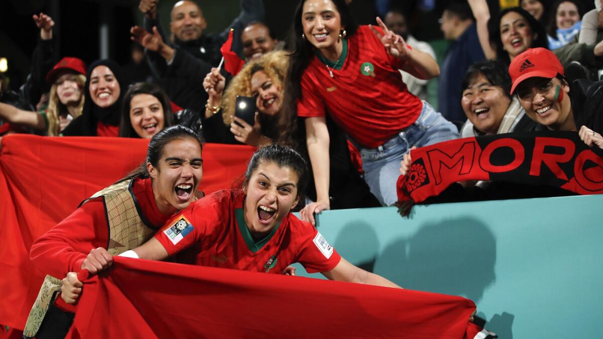 Morocco's Nesryne El Chad (centre) celebrates with fans after the Women's World Cup Group H soccer match between Morocco and Colombia in Perth. — AP