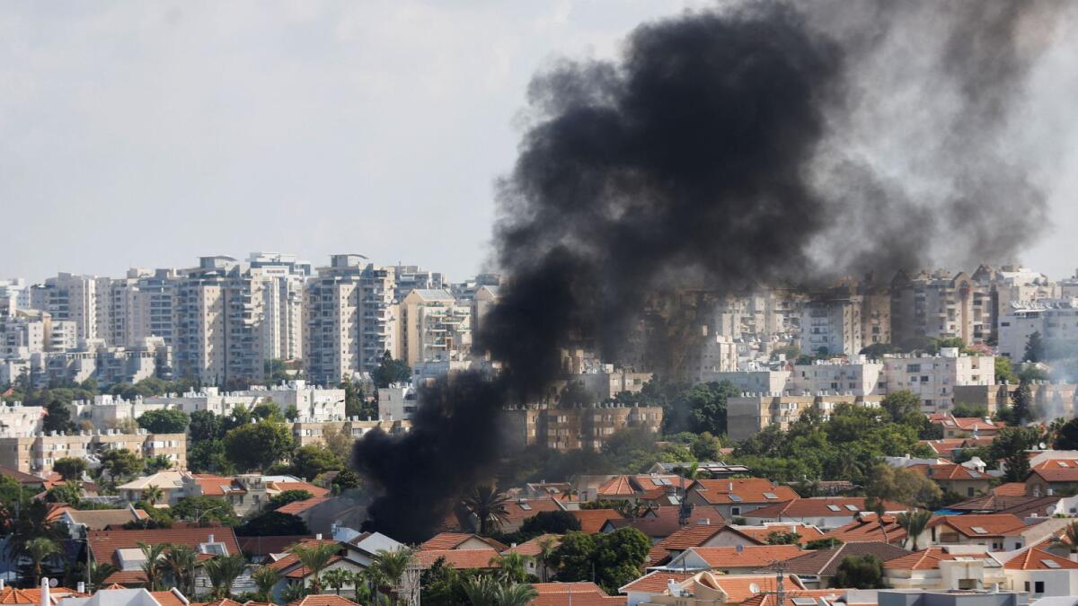 Smoke rises in the aftermath of rocket barrages that were launched from Gaza, in Ashkelon, Israel October 7, 2023. Reuters
