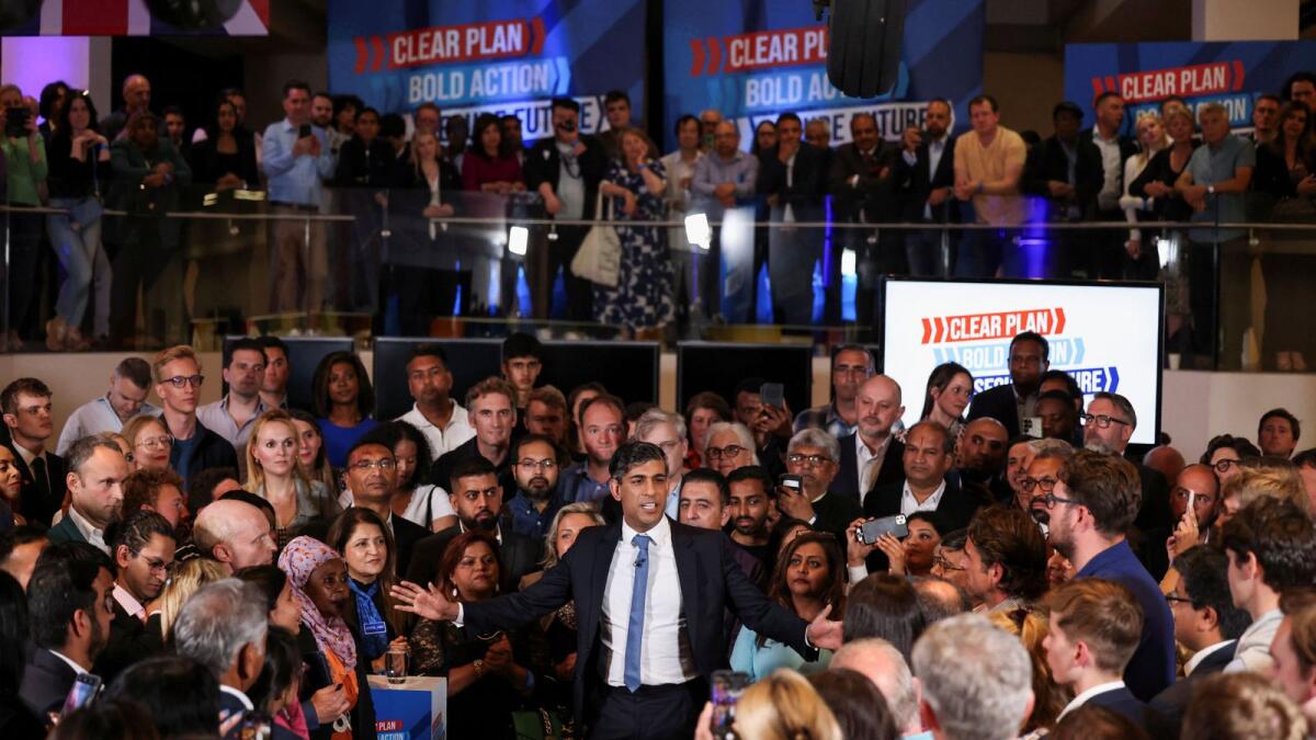 British Prime Minister Rishi Sunak gestures as he speaks at a campaign event in London on Tuesday. — Reuters