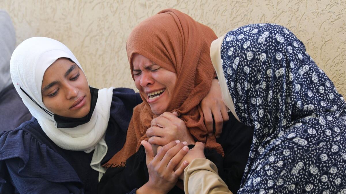 A Palestinian woman reacts after her son was killed in an Israeli strike at the European hospital in Khan Younis in the southern Gaza Strip. — Reuters