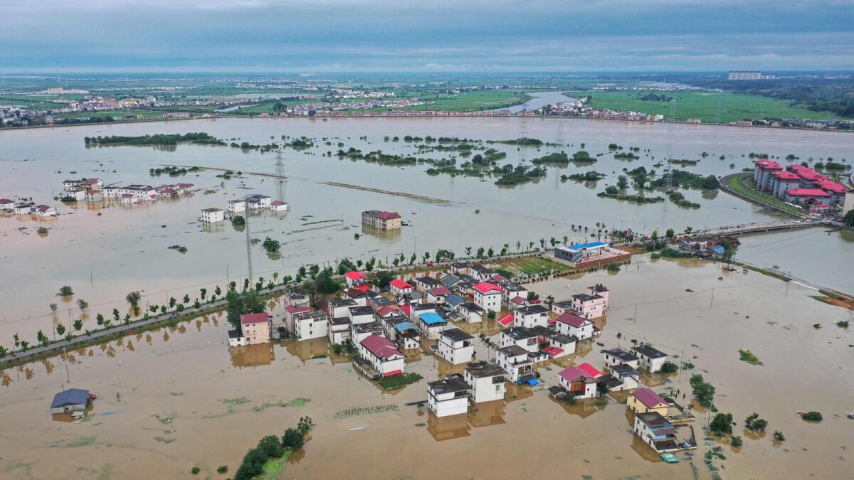 An aerial photo taken on Tuesday shows submerged buildings after floods  in Jiujiang, in central China's Jiangxi province. AFP
