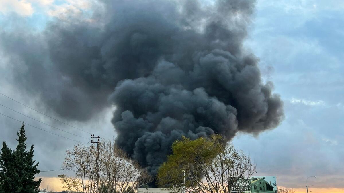 Smoke billows following an Israeli air raid on a reported hangar close to the main coastal highway in the southern Lebanese city town of Ghaziyeh. — AFP