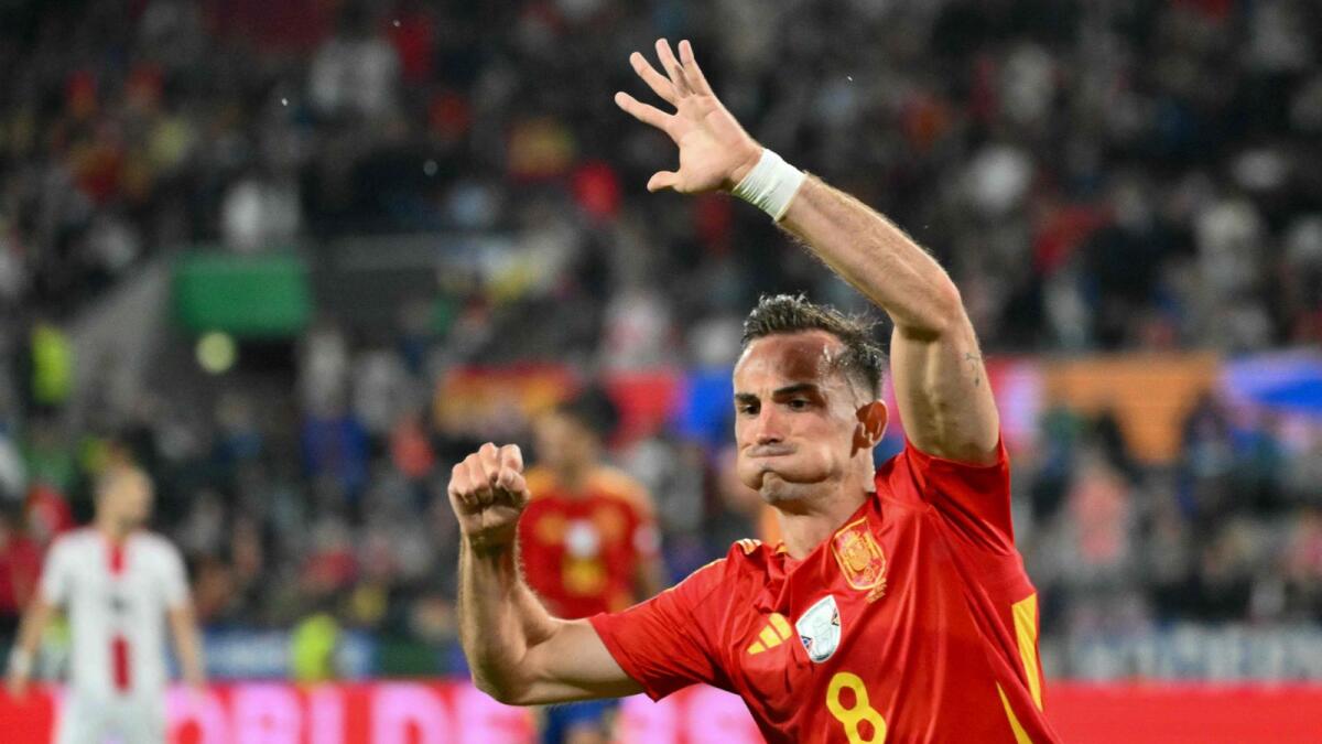 Spain midfielder Fabian Ruiz celebrates after scoring his team's second goal. — AFP