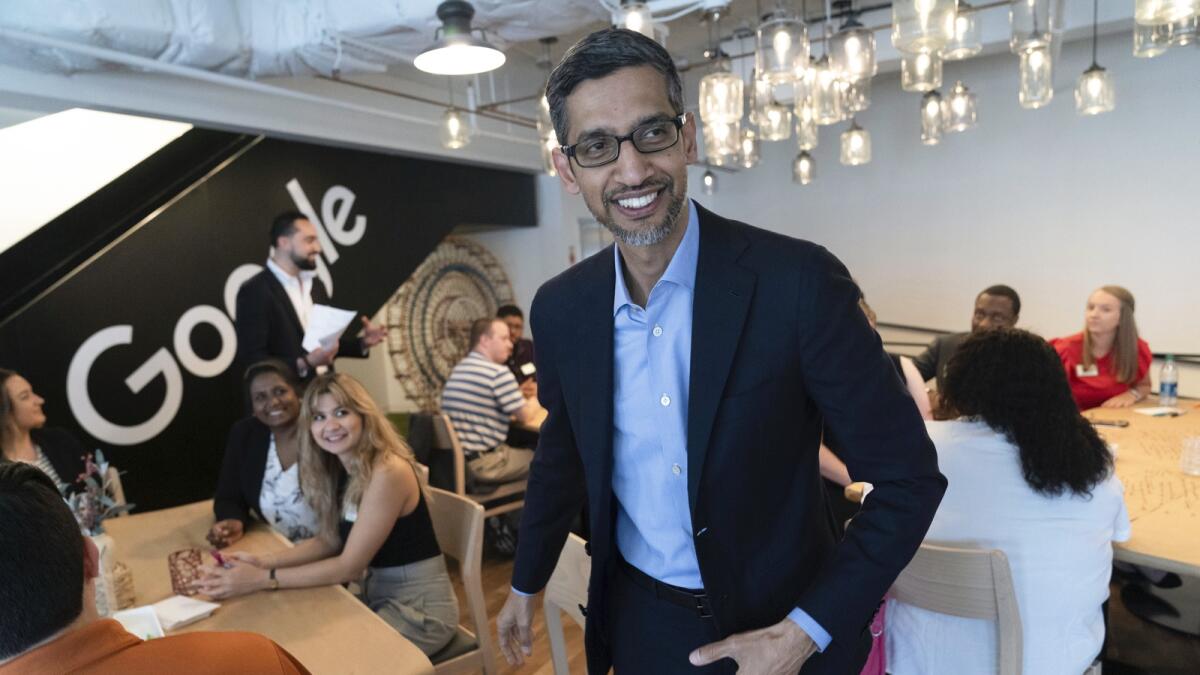 Google CEO Sundar Pichai attends a workshop with college students at the Google office in Washington. — AP