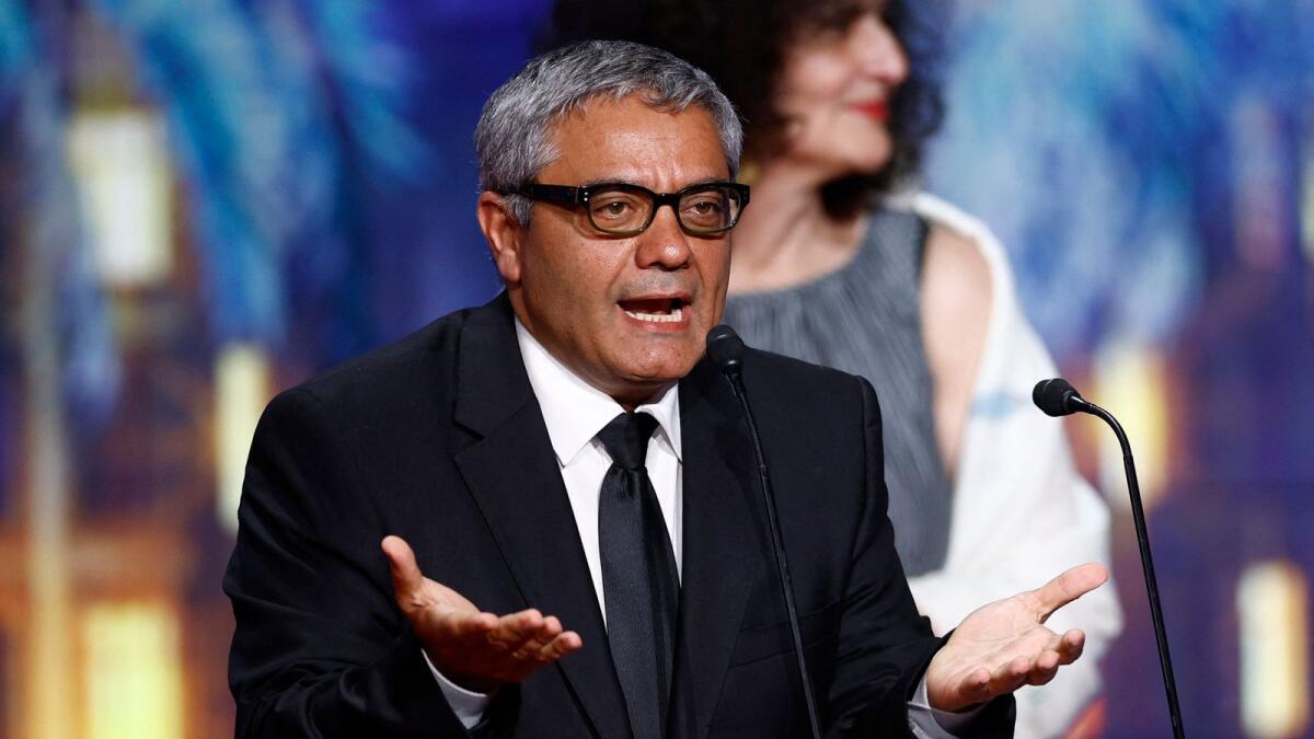 Director Mohammad Rasoulof reacts during the closing ceremony of the 77th Cannes Film Festival in Cannes. — Photo: Reuters