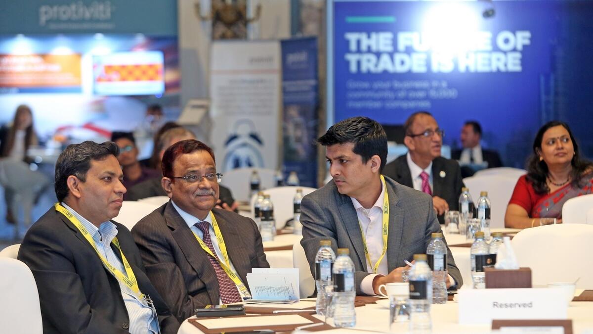 Attendees participate in the Dubai Global Convention 2018 on Wednesday.
