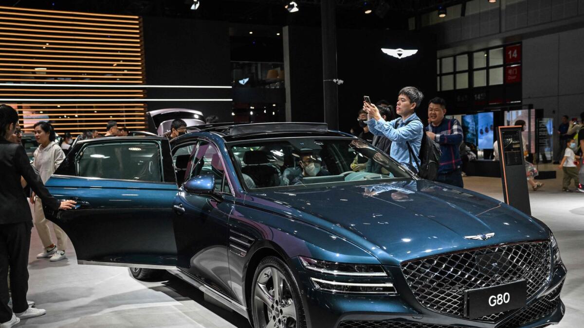 A Genesis G80 is displayed during the 20th Shanghai International Automobile Industry Exhibition. - AFP