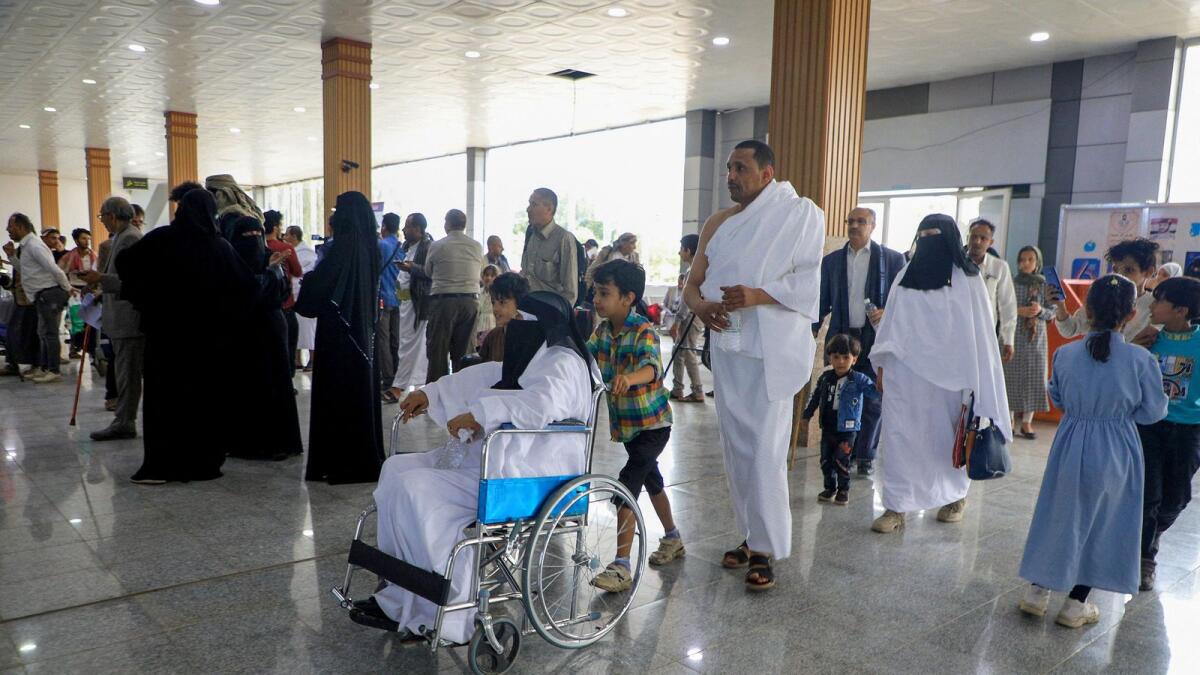 Yemeni Muslims wait at the Sanaa International Airport's to board a flight heading to holy city of Makkah to perform the Haj pilgrimage, on Saturday -- AFP