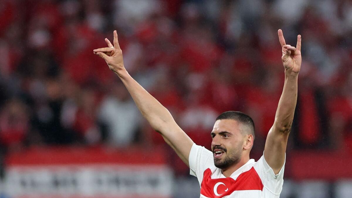 Turkey's defender Merih Demiral makes a controversial hand gesture as he celebrates scoring his team's second goal during the UEFA Euro 2024  match between Austria and Turkey at the Leipzig Stadium in Leipzig on July 2, 2024. — AFP
