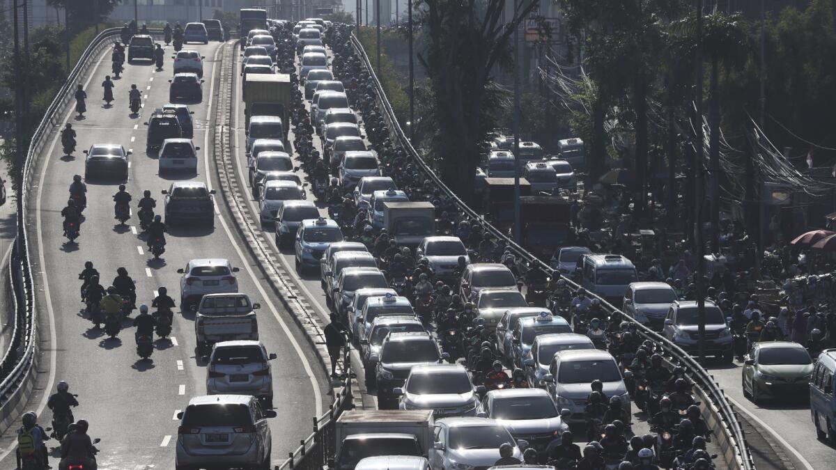 Vehicles are caught in a congestion during a rush hour in Jakarta. — AP file
