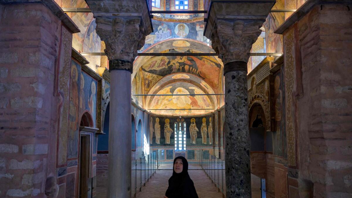 A visitor stands inside the ancient Orthodox church now converted as the Kariye Mosque in Istanbul. — Photo: AFP