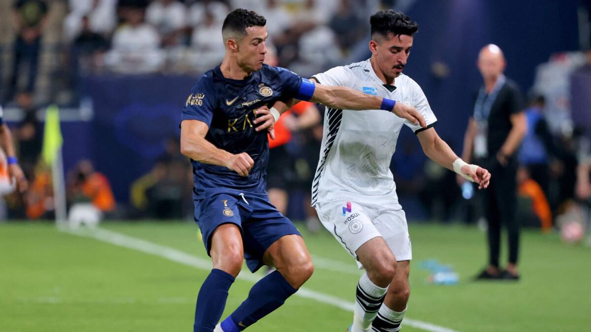 Al Nassr's Cristiano Ronaldo (L) vies for the ball with Al Shabab's defender Nader Al Sharari during the Saudi Pro League football match in Riyadh. — AFP file