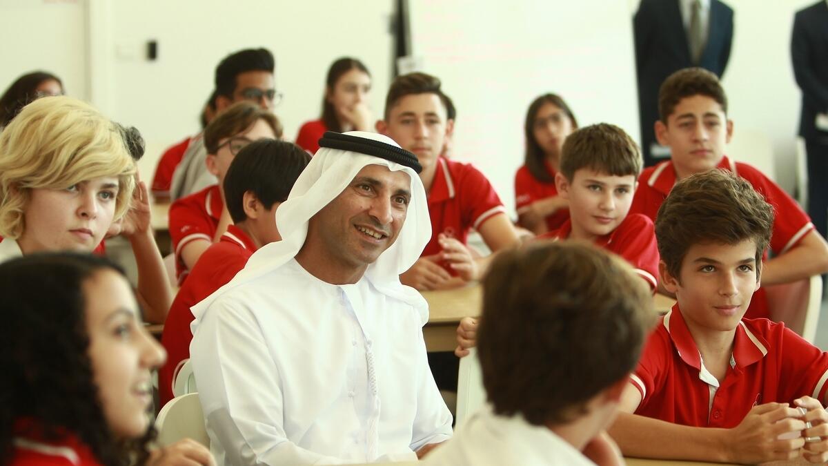 Dr. Abdulla Al Karam of KHDA with students at the Swiss International Scientific School Dubai. - Photo by Shihab