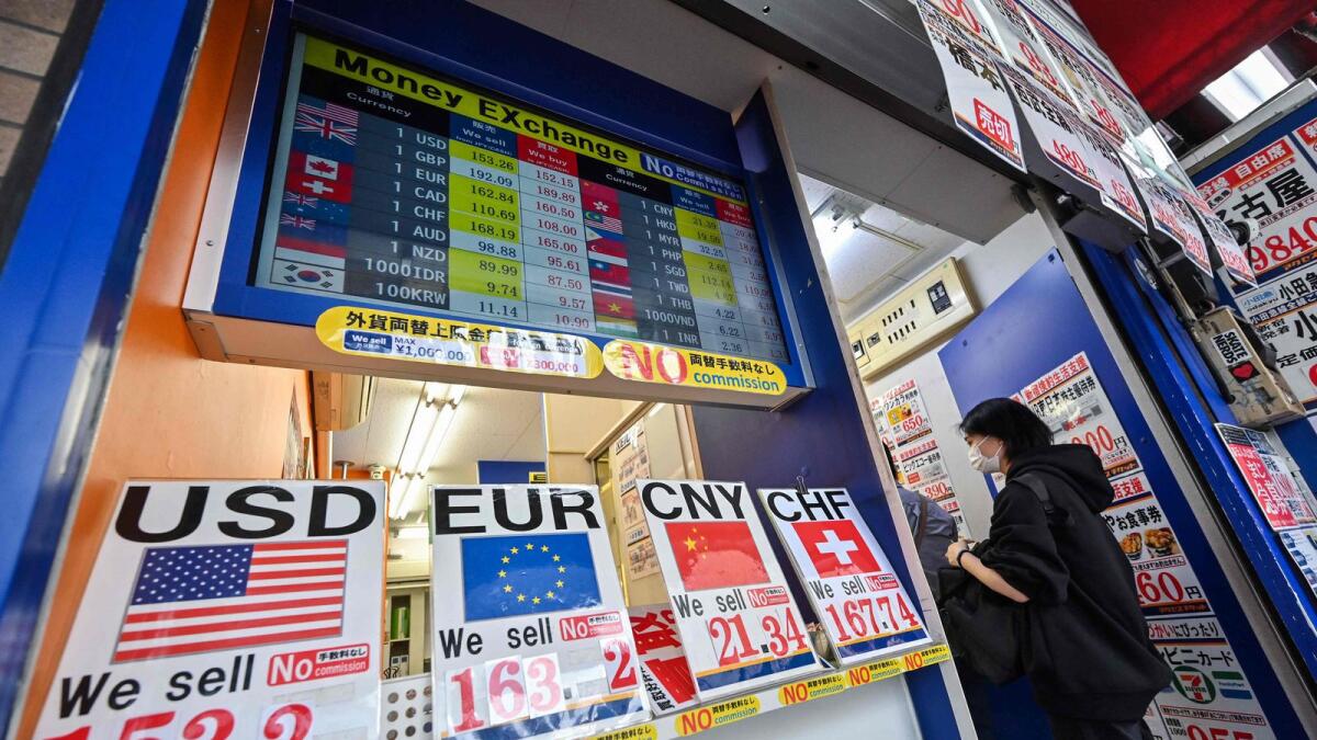 Acurrency exchange shop in central Tokyo. — AFP