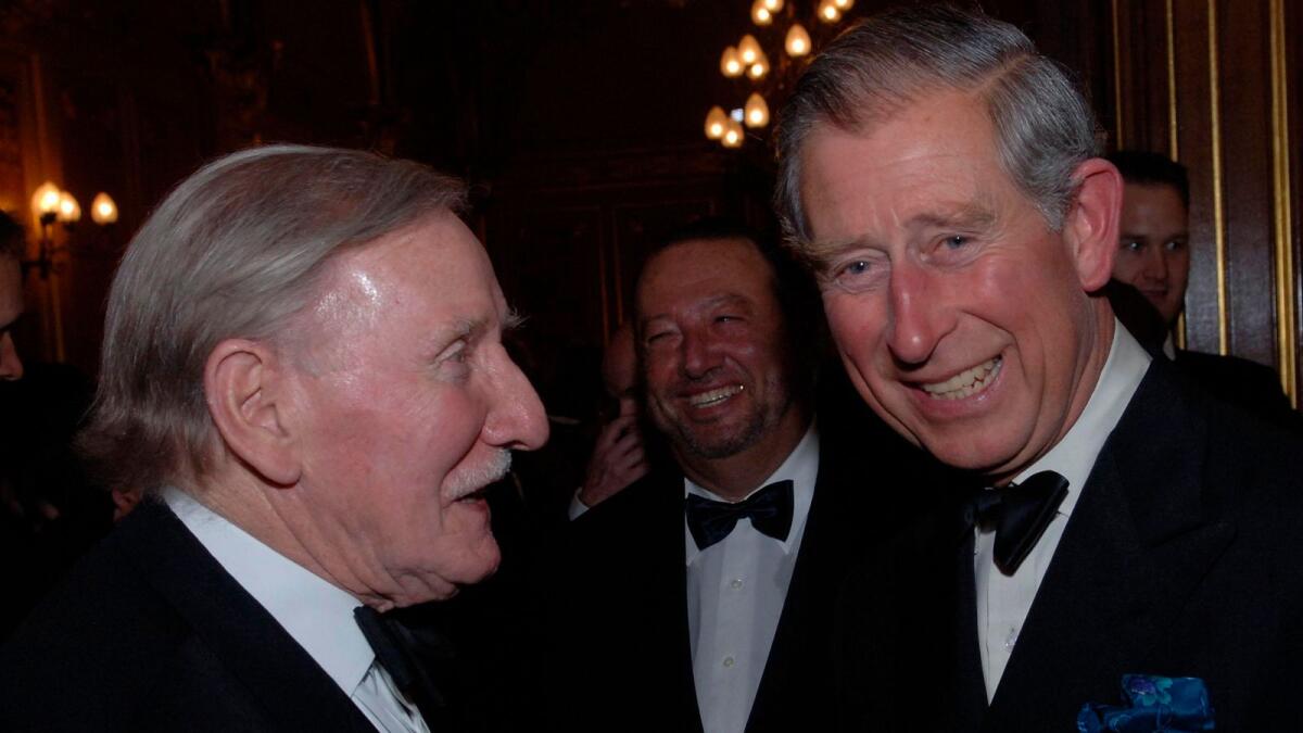 King Charles with Leslie Philips in 2006. — AP file