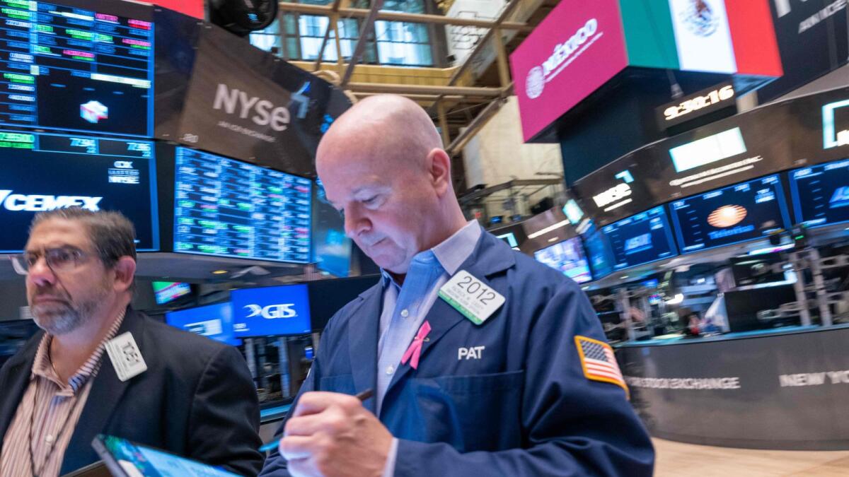 Traders work on the floor of the New York Stock Exchange. The Russell 2000 is up just 0.4 per cent year-to-date, far less than the S&amp;P 500’s 7.5 per cent gain. — AFP