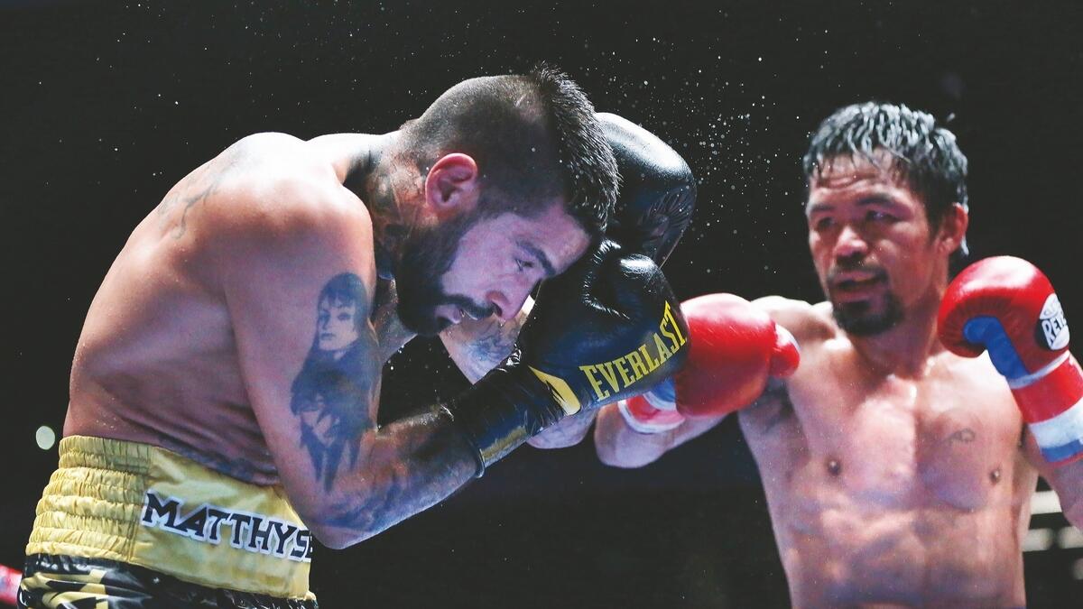Pacquiao rolls back the years to beat Matthysse