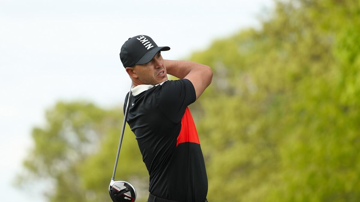 Koepka in control at PGA Championship, Woods nine back