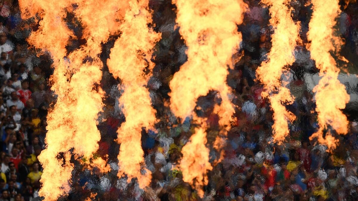 Flames shoot into the air during the closing ceremony of the Russia 2018 World Cup ahead of the final football match between France and Croatia.- AFP