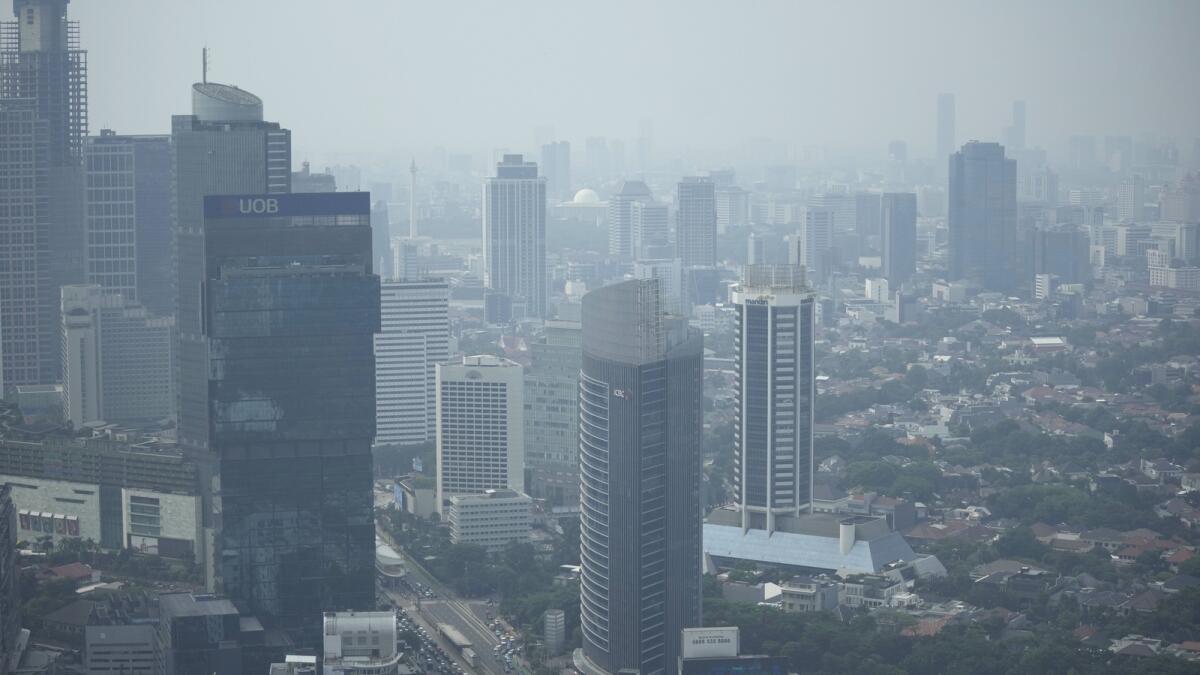Haze blankets the main business district in Jakarta. — AP
