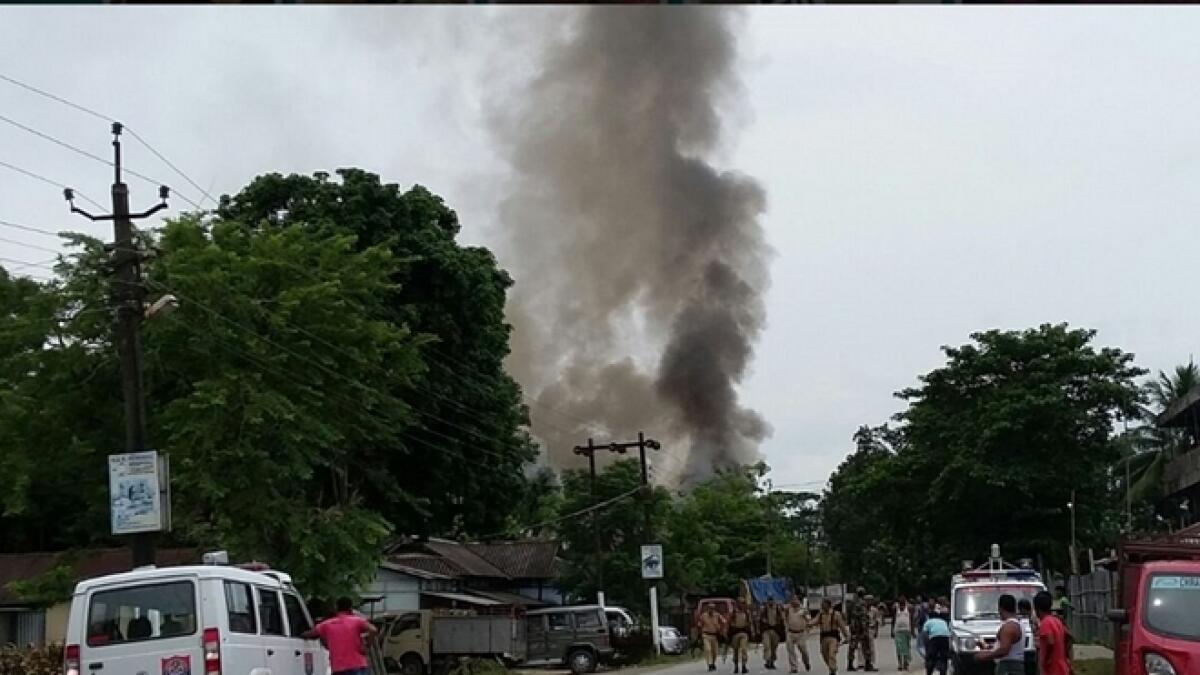 Smoke billowing near the site of the attack near Kokrajhar in Assam