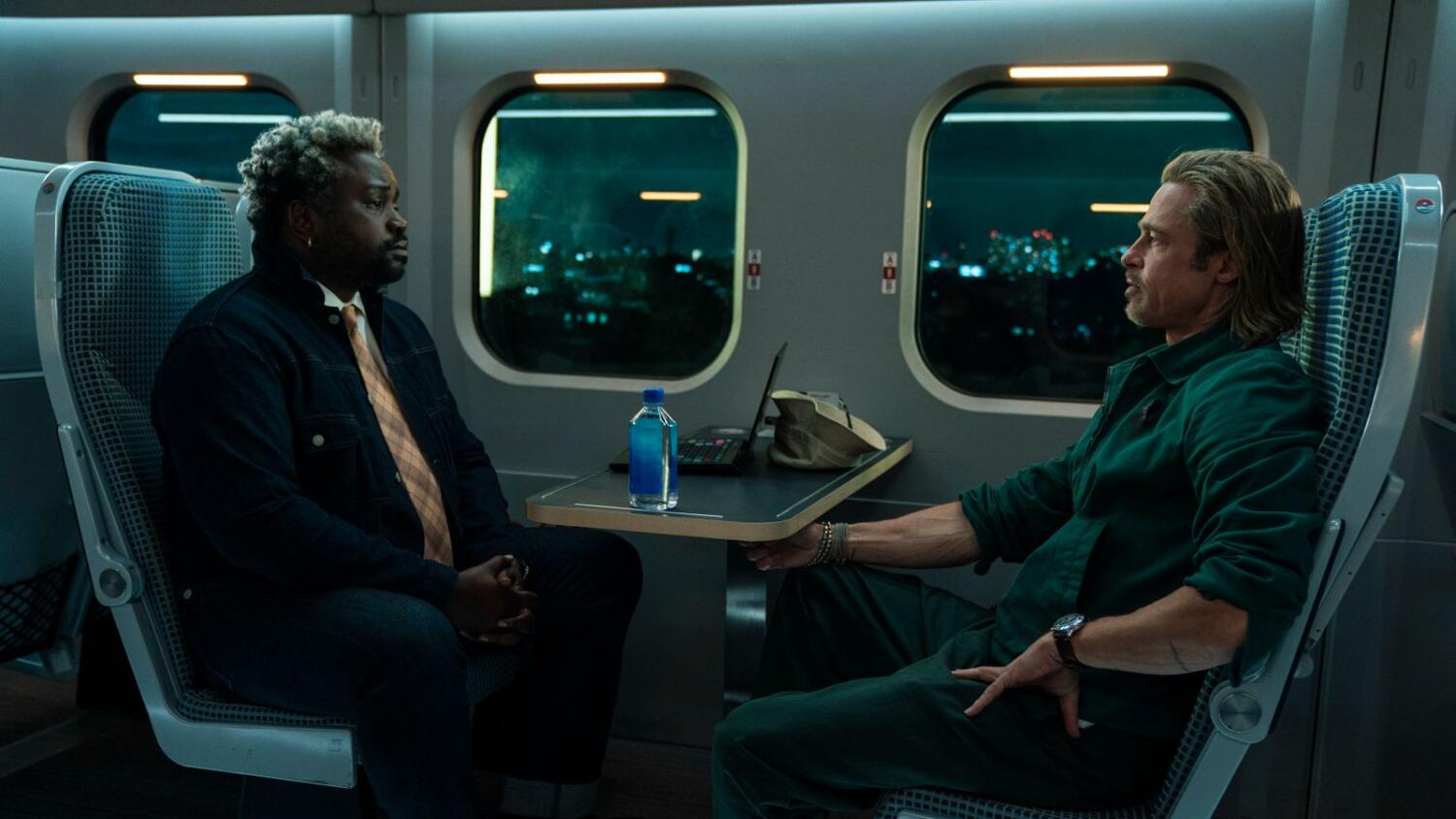 This image released by Sony Pictures shows Bryan Tyree Henry, left, and Brad Pitt in a scene from 'Bullet Train.' (Scott Garfield/Sony Pictures via AP)