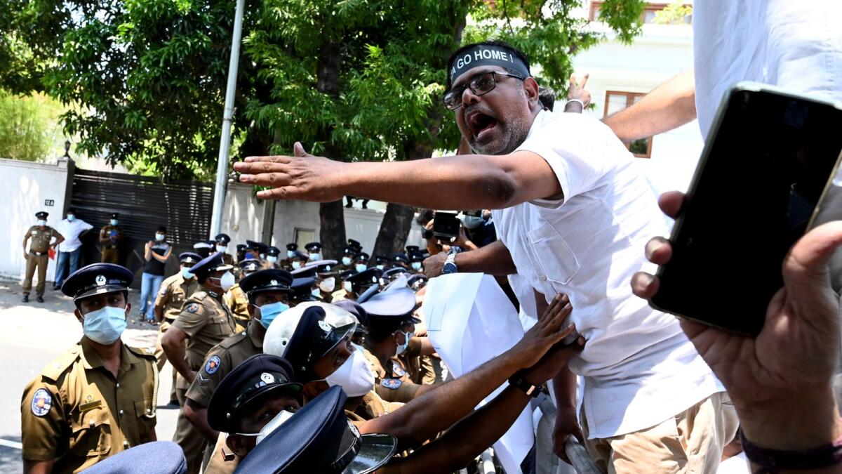 Sri Lanka's main opposition parliament members shout slogans as they protest in Colombo on April 3, 2022. Photo: AFP