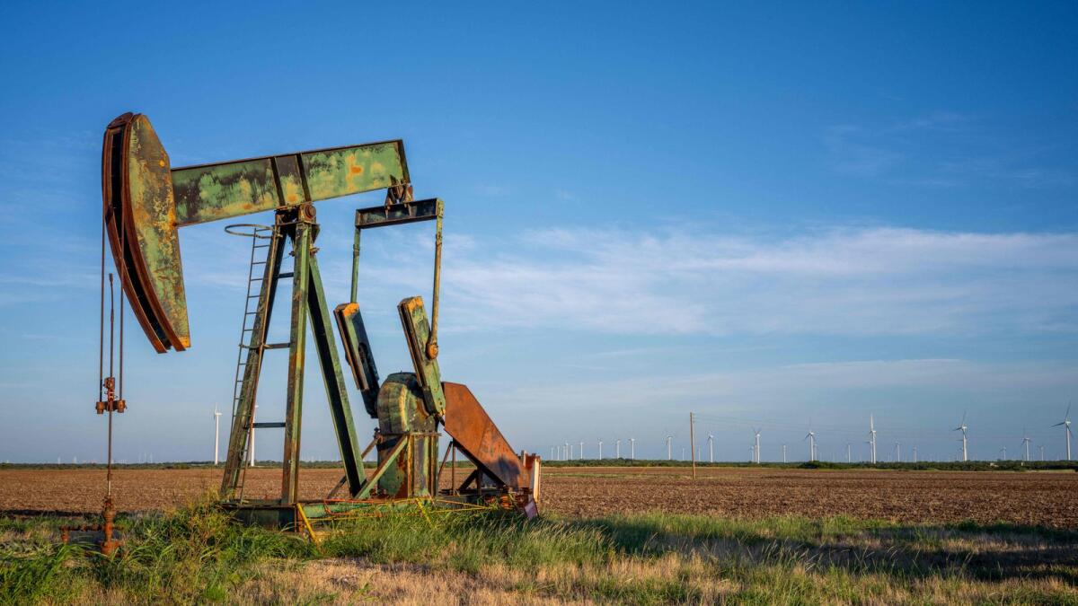 An oil pump jack is shown in a field on June 28, 2024 in Nolan, Texas.  — AFP