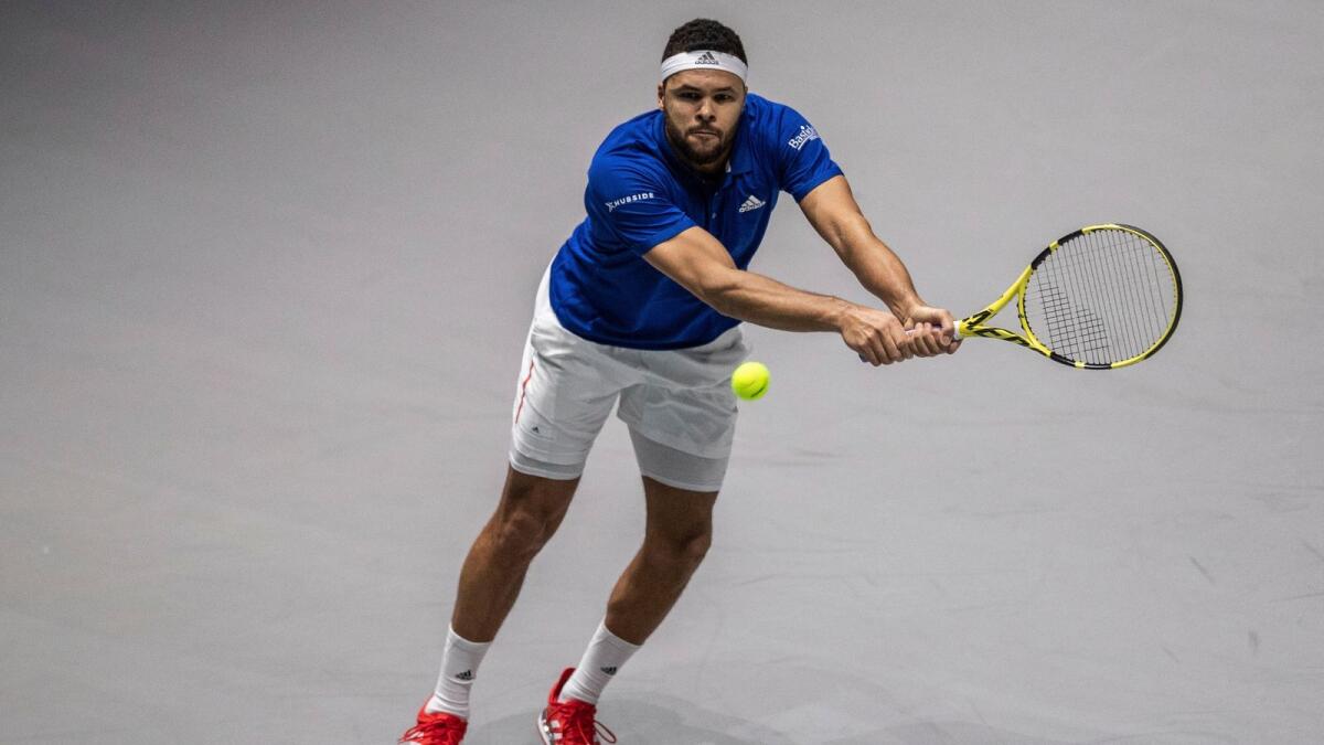 France's Jo-Wilfried Tsonga returns the ball to Serbia's Filip Krajinovic during a Davis Cup match. — AP file