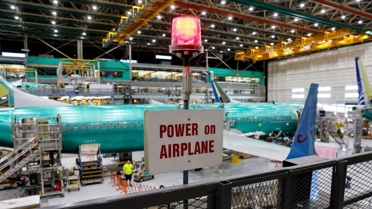 Boeing 737 MAX aircraft are assembled at the company’s plant in Renton, Washington. Manufacturing is being pressured by higher interest rates and softening demand for goods. — Reuters file