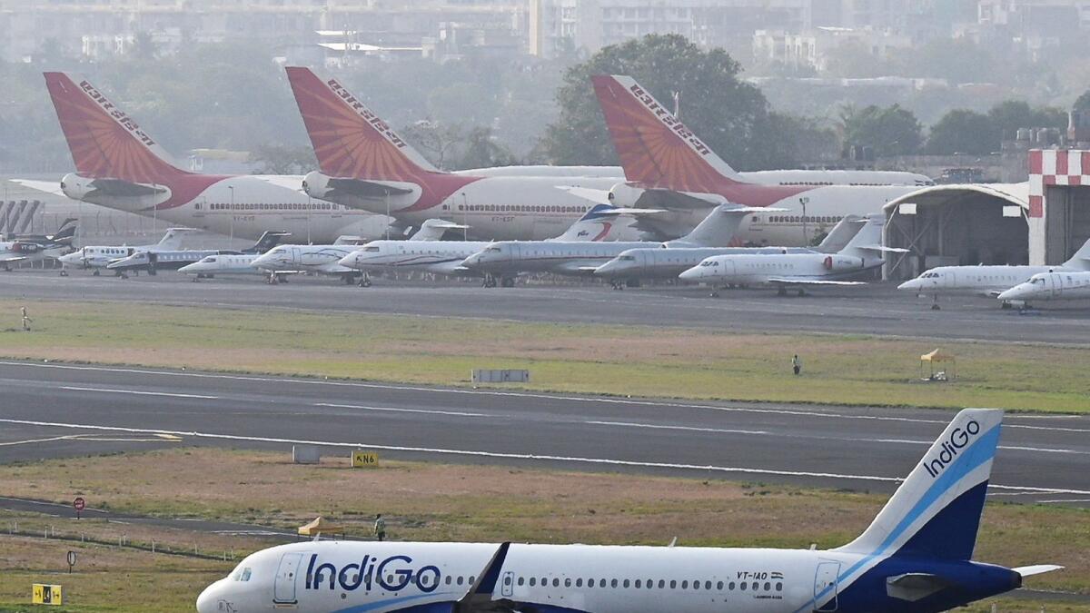 An Indigo airlines aircraft taxies in the apron at the Mumbai International airport in Mumbai on Tuesday. Indian low-cost carrier IndiGo said on June 19 it had ordered a record 500 A320 airliners from European manufacturer Airbus at the Paris Air Show. — AFP