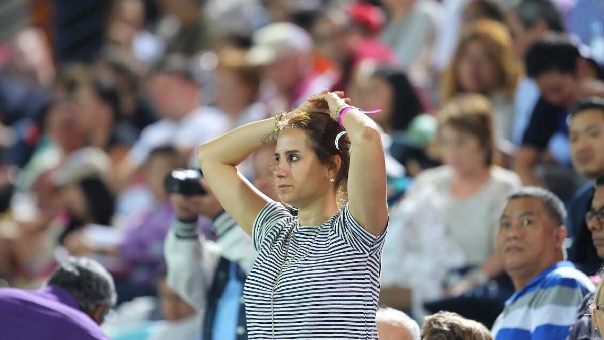 OH MY GOD WHAT'S HAPPENING: This spectator can't believe that her favourite player Stan Wawrinka (SUI) lost the first set during the match against Sergiy Stakhovsky (UKR) in the  Dubai Duty Free Tennis Championships on Tuesday, 23 February 2016. Photo by Kiran Prasad
