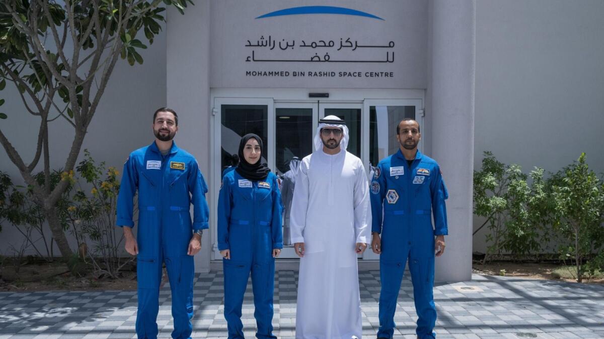 Sheikh Hamdan with stronauts Office Manager Hazzaa AlMansoori and astronauts Mohammad AlMulla and Nora AlMatrooshi at MBRSC. — Photo courtesy: Dubai Media Office